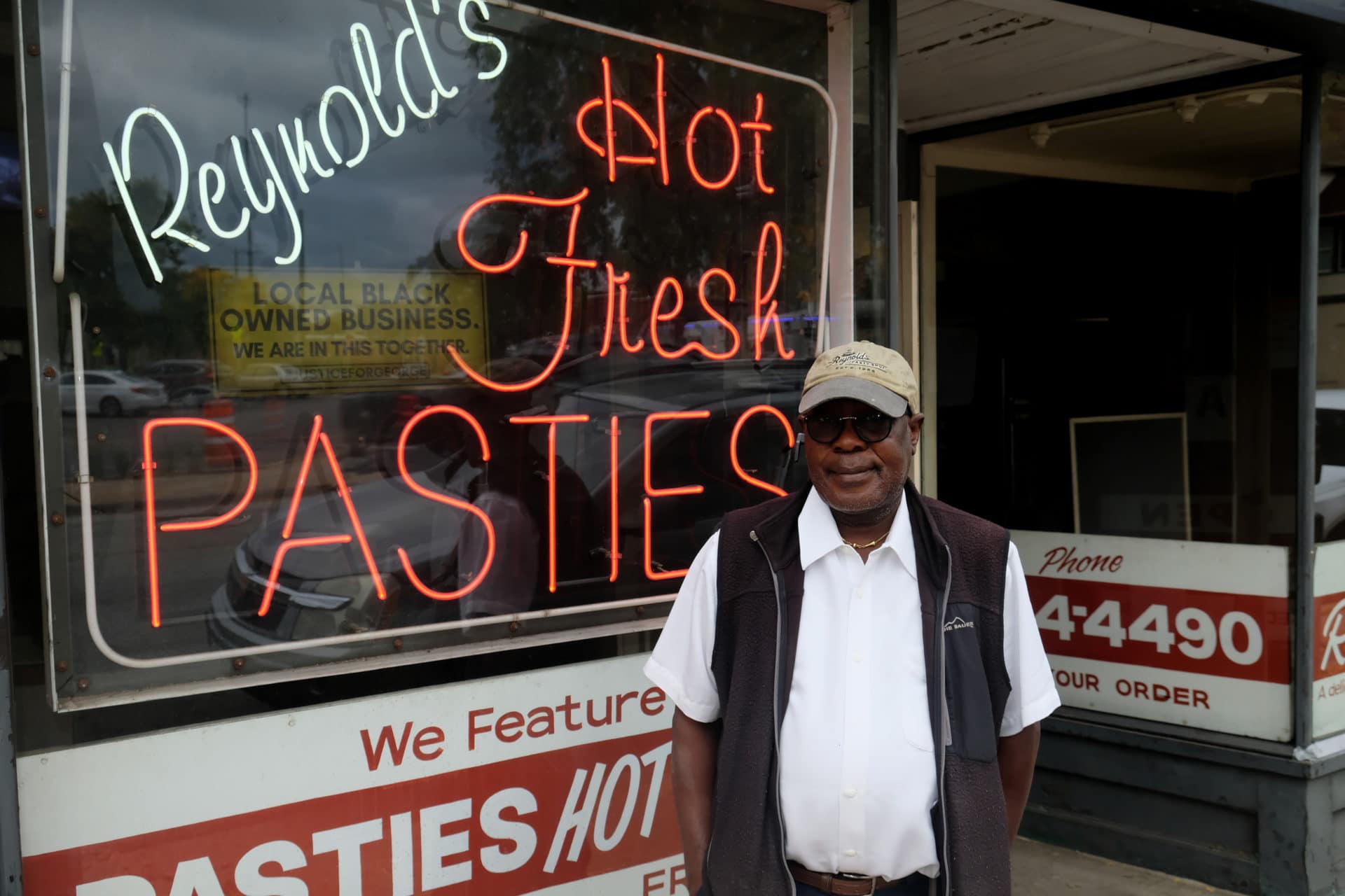 Adedokun stands outside his shop. Although he has been a businessman and restaurateur for more than 30 years, Adedokun works right alongside employees in the kitchen and has been helping through the pandemic when staff numbers have been lower.