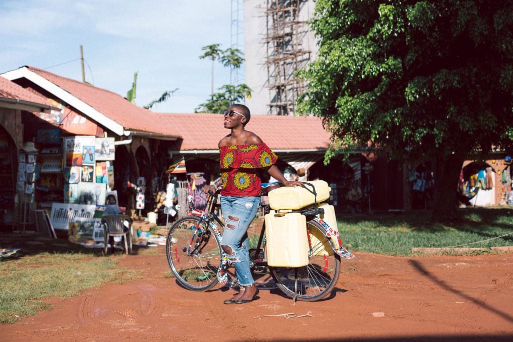 Nabongo with a bike.
