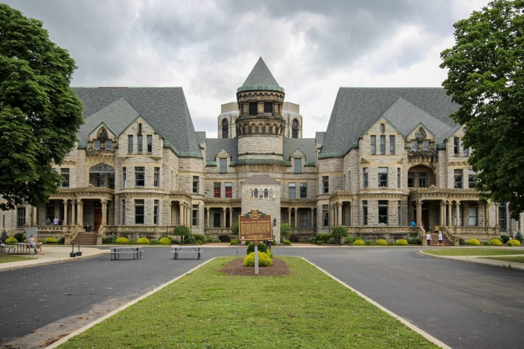 A front view of the Ohio State Reformatory's towering and symmetrical buildings