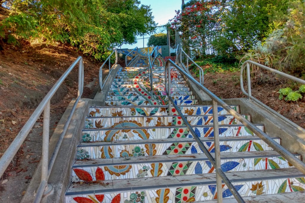 Mosaic tiled staircase with a floral and decorative motif