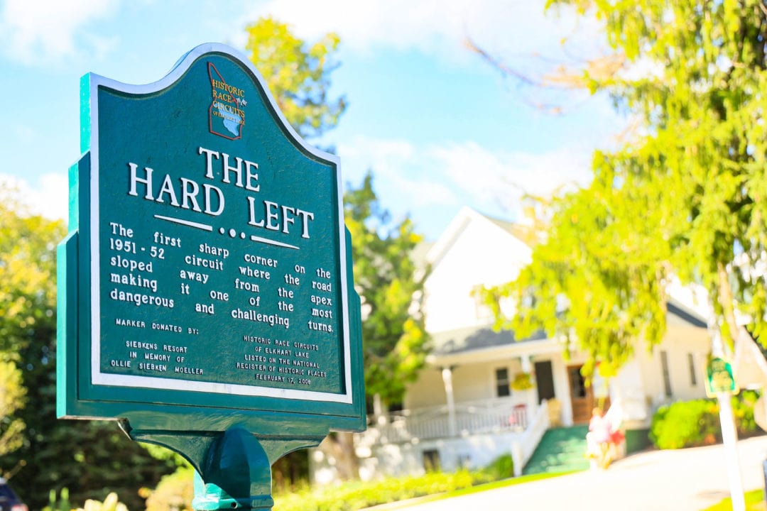A green historic marker that reads "The Hard Left"