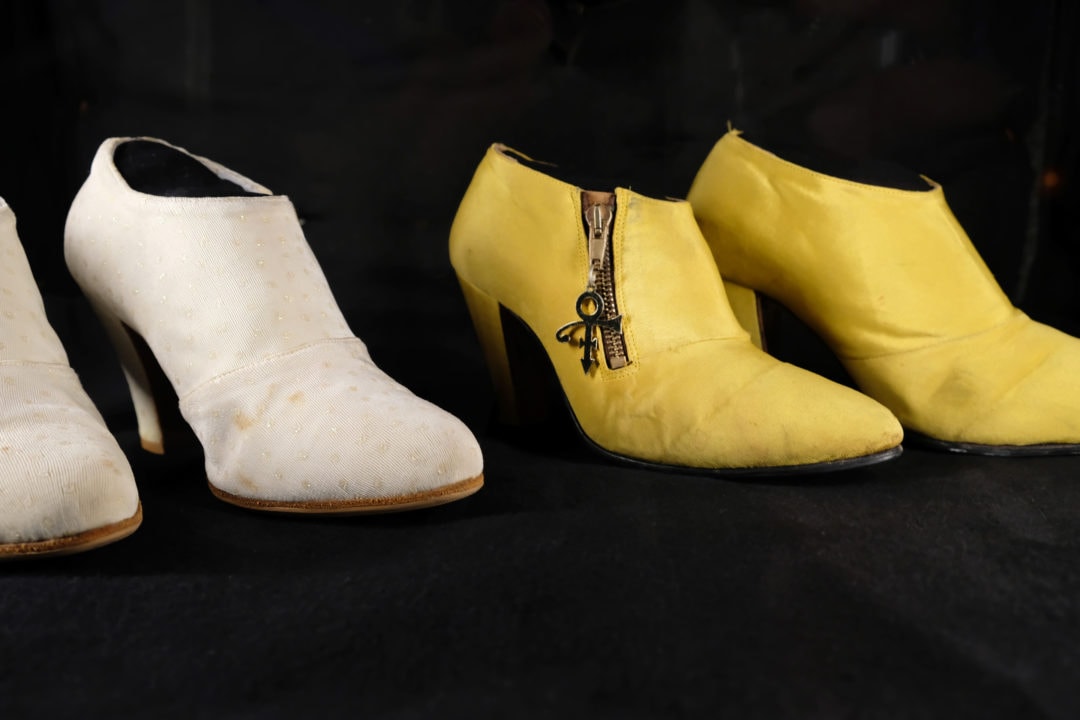 high heeled shoes in yellow and white leather