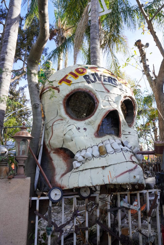 A large skull with "Tio's Tacos Riverside" painted on its forehead 