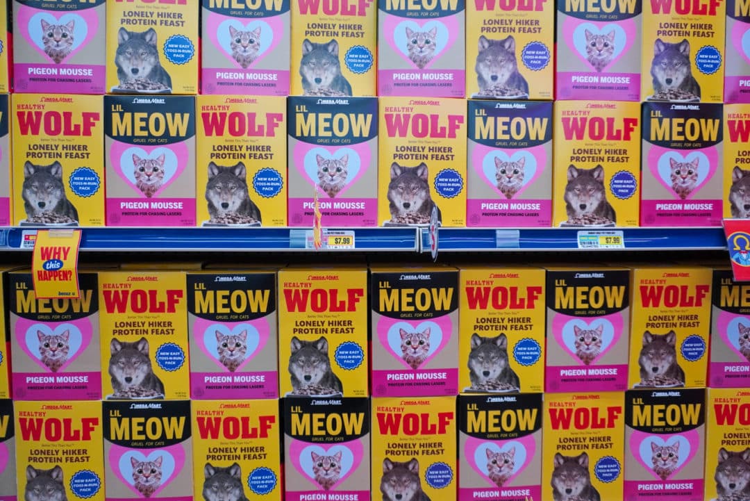 Boxes with cat and dog food lined up to spell out "Meow" and "Wolf"