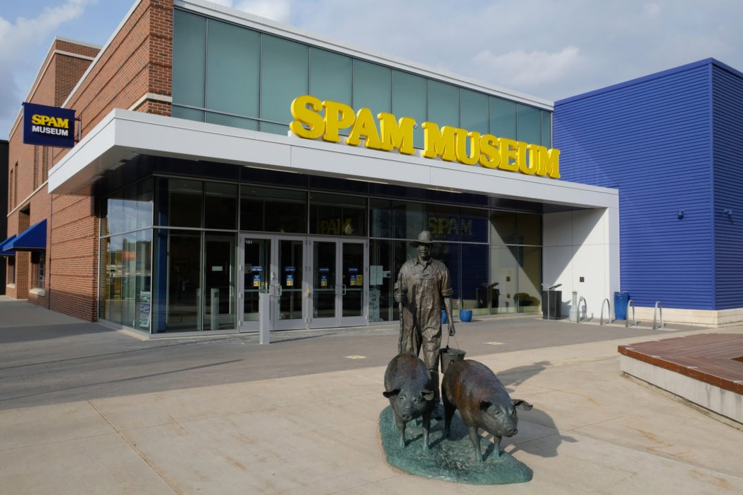 the blue and yellow exterior of the spam museum