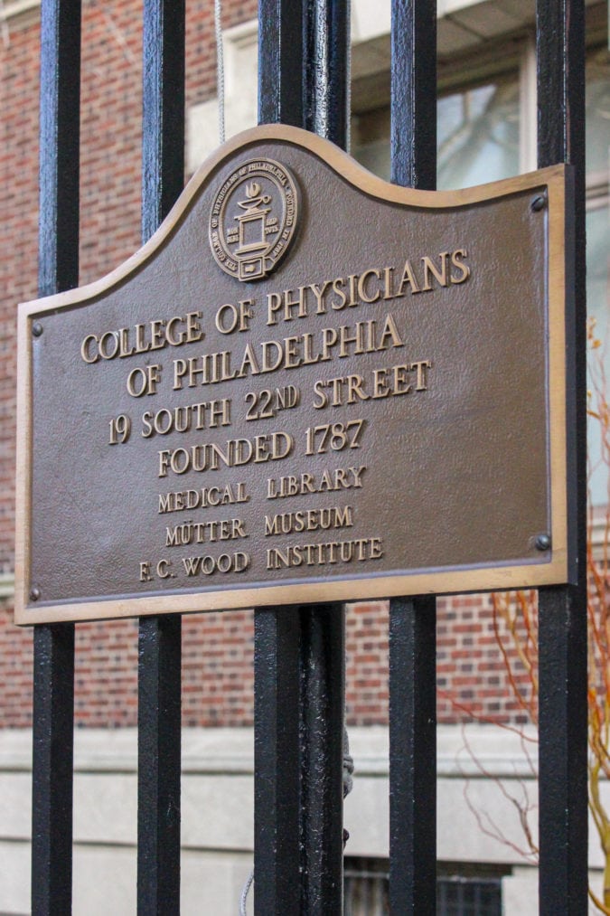 a plaque that says "college of physicians of philadelphia 19 south 22nd street founded 1787 medical library mutter museum f.c. wood institute"