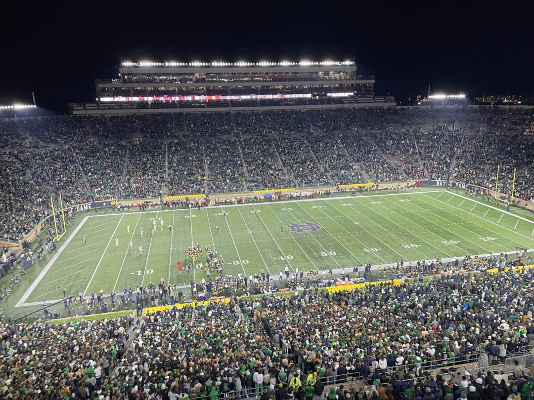 View of the field and crowd taken from the bleachers