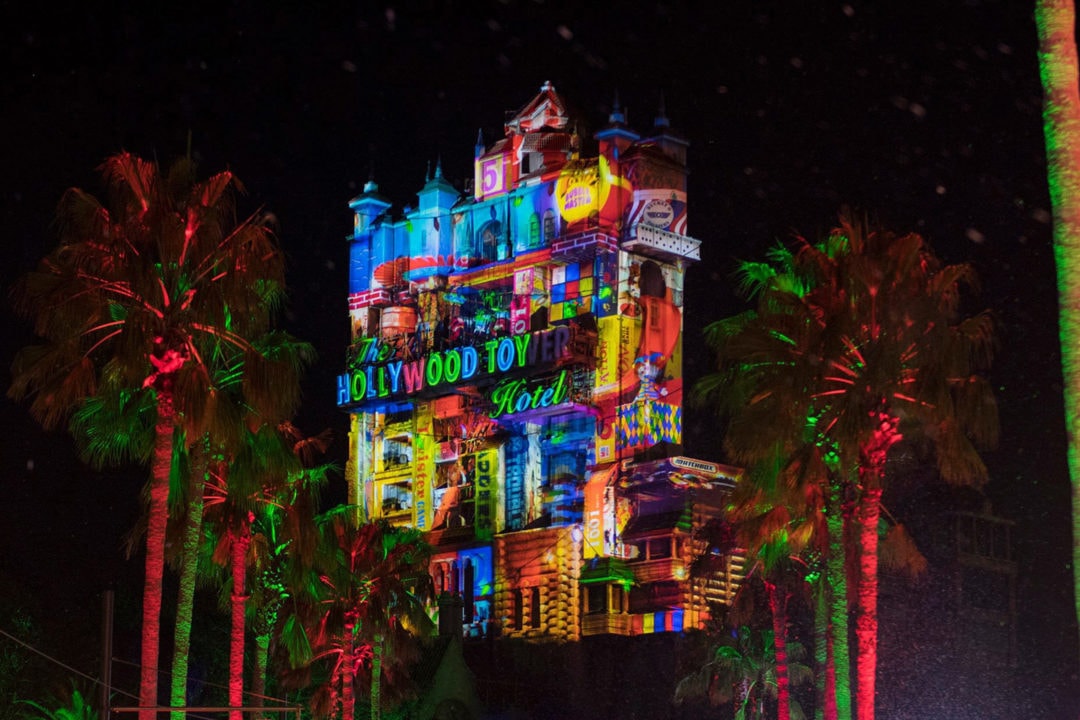 a night shot of the hollywood tower hotel lit up