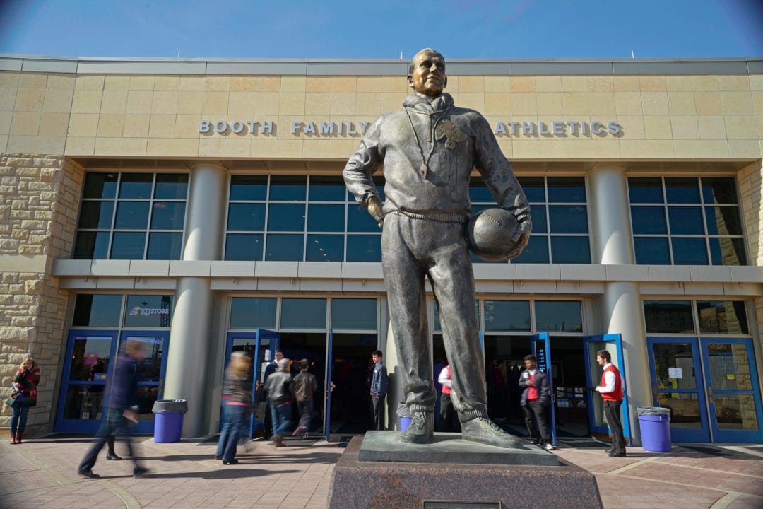 A statue of Phog Allen stands guard at the entrance of the Booth Family Hall of Athletics.
