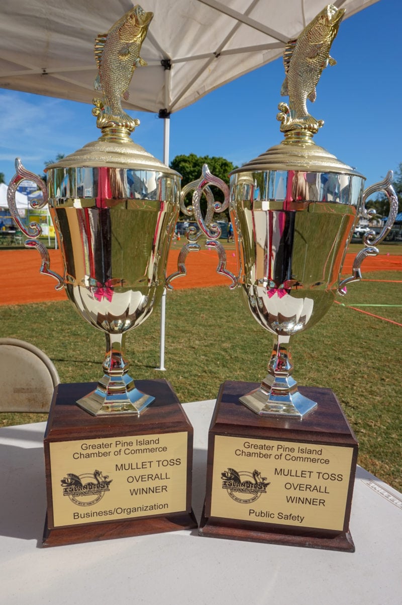 Toss for a cause How a strange, fishy tradition took root in a Florida