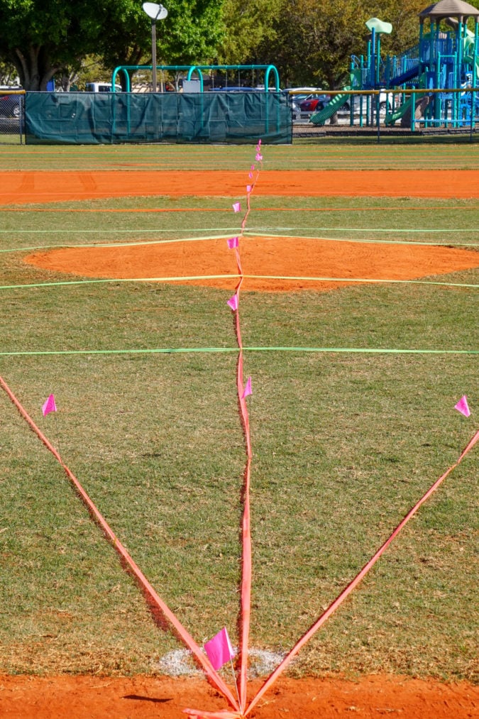 plastic strips measure distance on a field