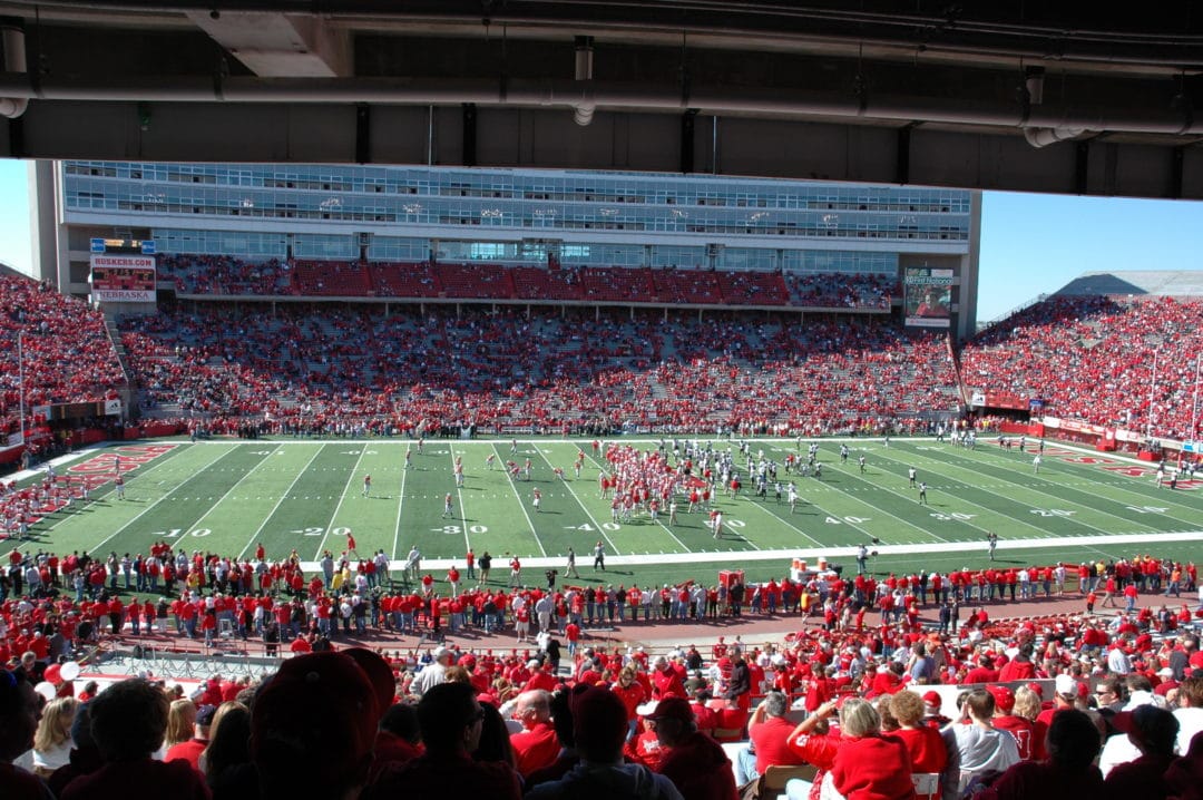 Fans wearing red at the University of Nebraska's football stadium