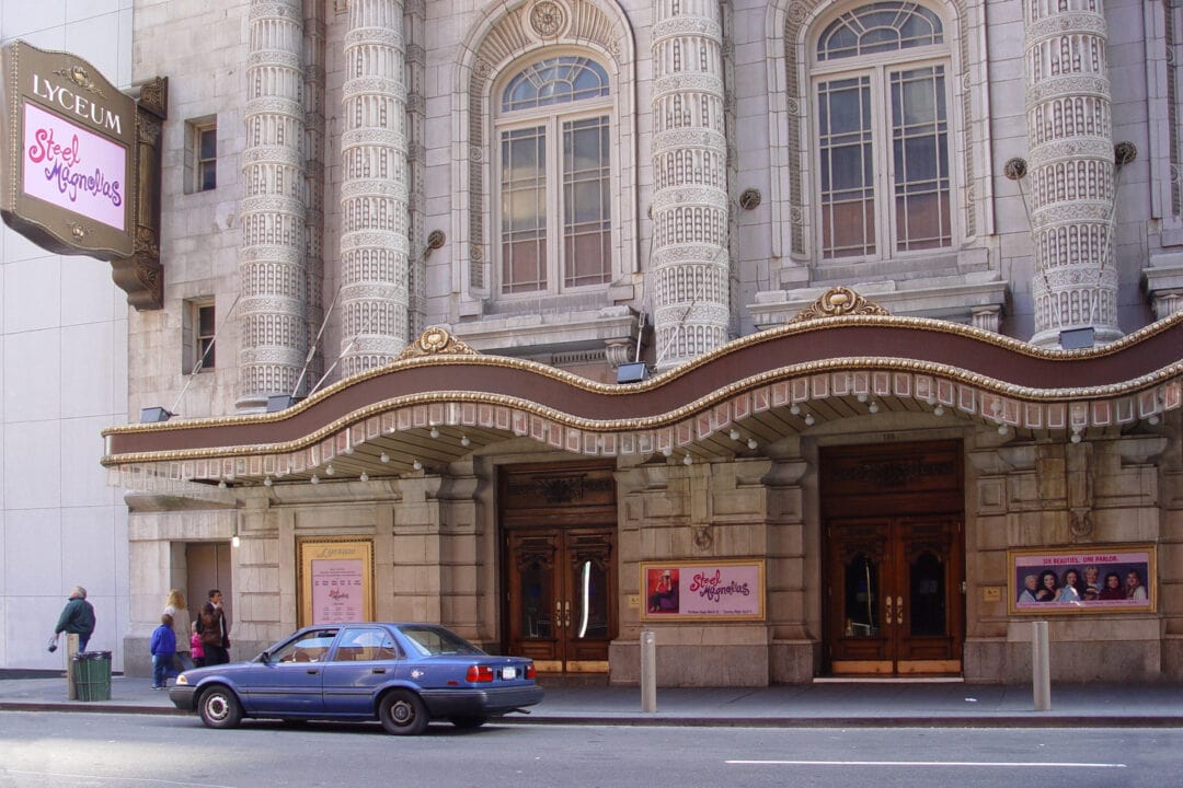 the ornate undulating awning of the lyceum broadway theater 
