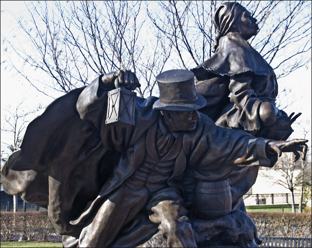 A bronze statue of Harriet Tubman and Thomas Garrett