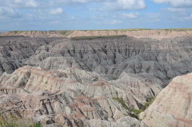 Rock formations featuring unique stripes and colors due to wind and water erosion