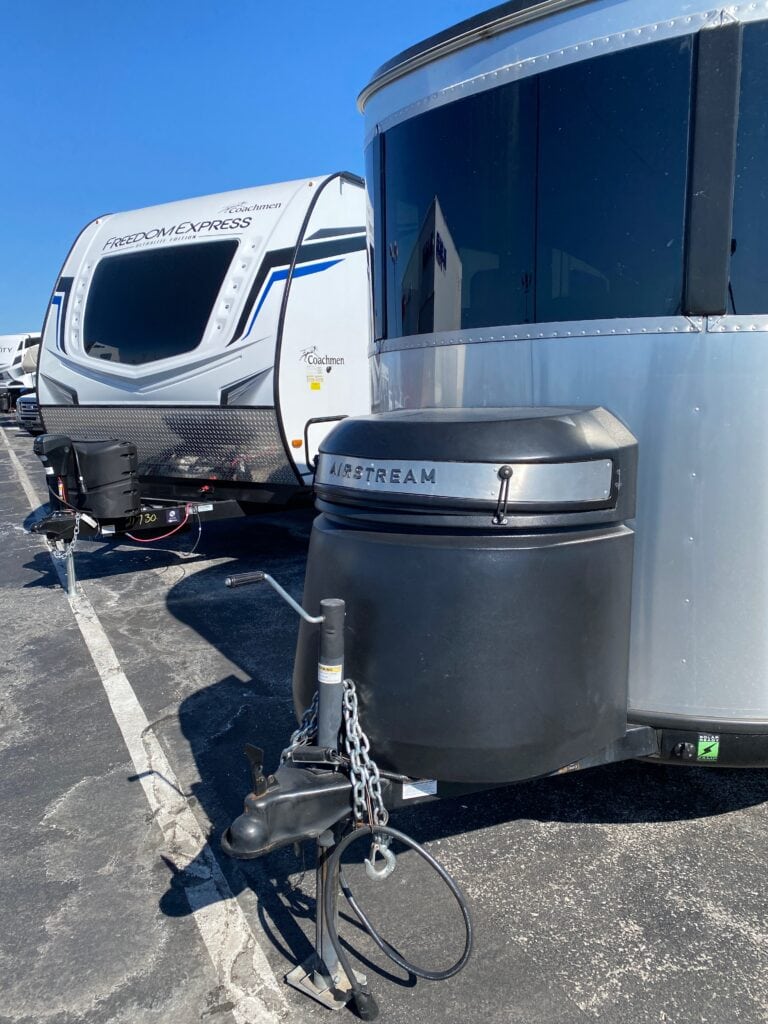RV A-frame chassis with towing chains and jack connected