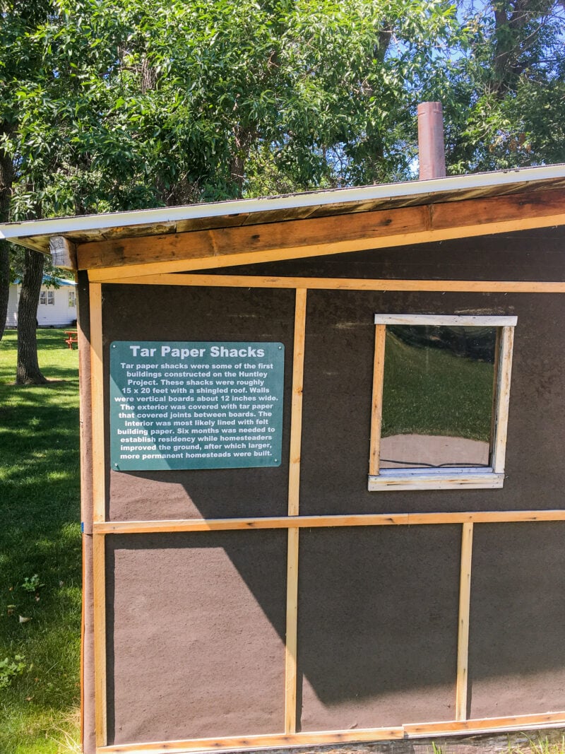 A tar paper shack replica at a museum