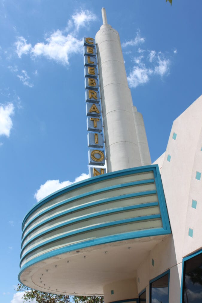 a blue and white art deco theater marquee that says "celebration"