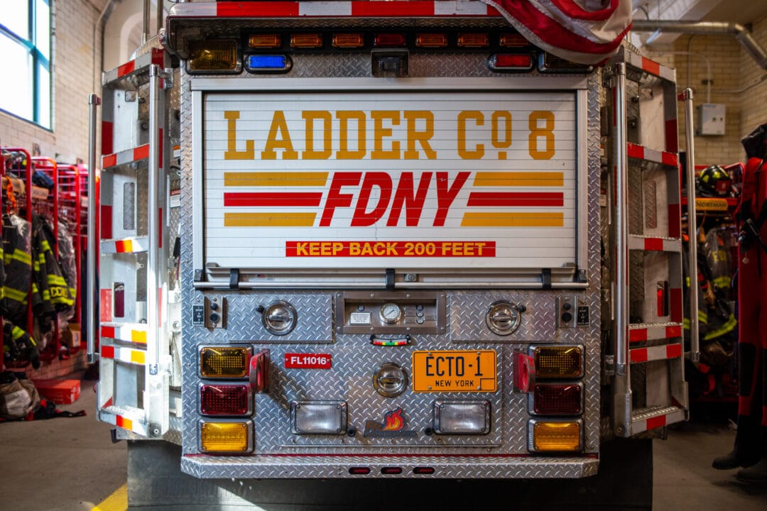 the back of a firetruck painted to say "ladder co. 8 FDNY"