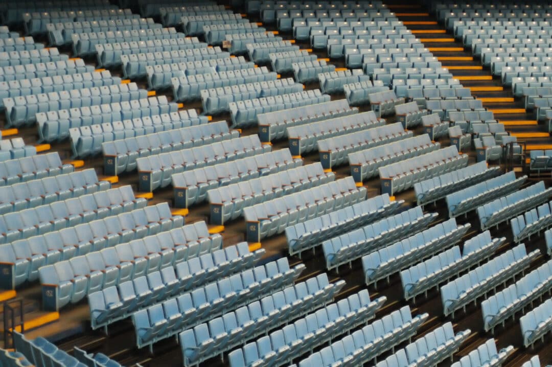 Baby blue gymnasium seating inside the Dean Smith Center in North Carolina