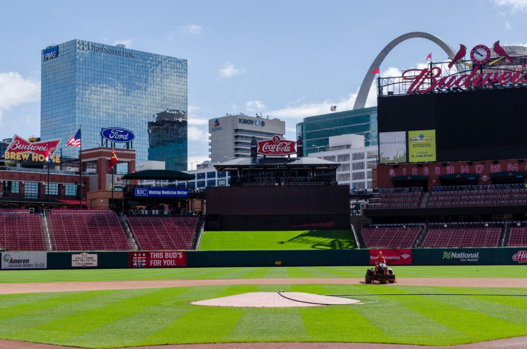 Busch Stadium baseball field with the Gateway Arch in the background