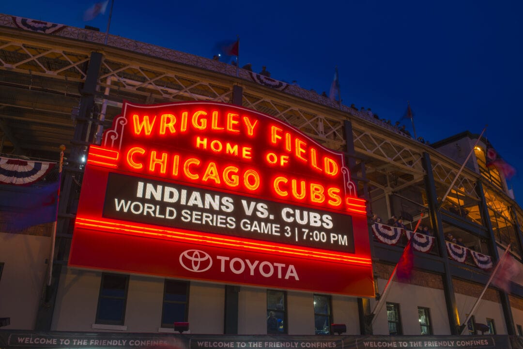 Red neon signage of Wrigley Field in Chicago