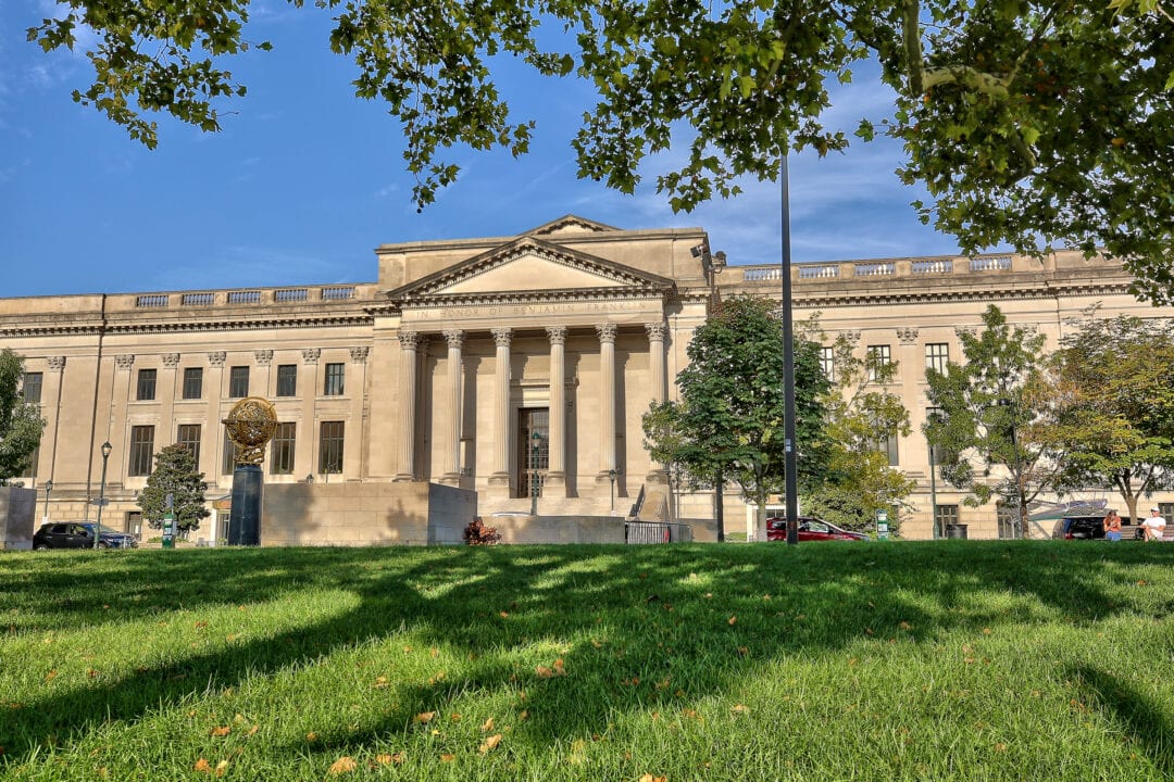 the classical beige facade and columns of the 2-story franklin institute