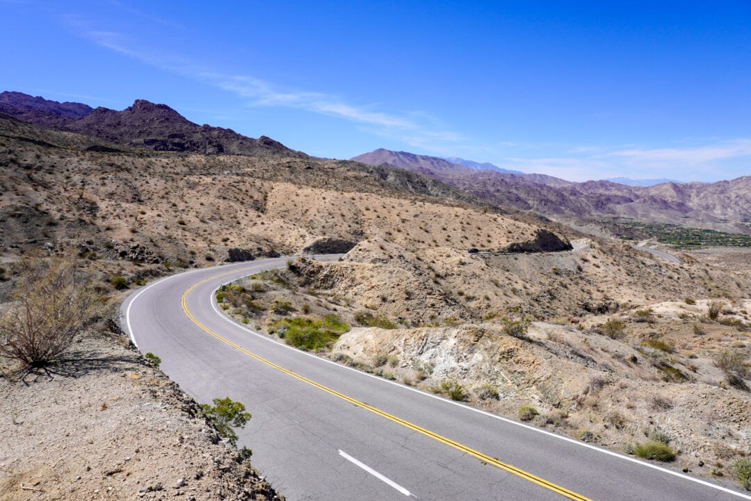 View of a switchback road in a desert mountain landscape