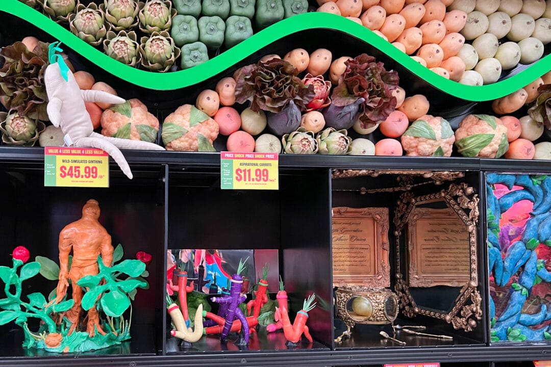 shelves with fake food and other objects on display