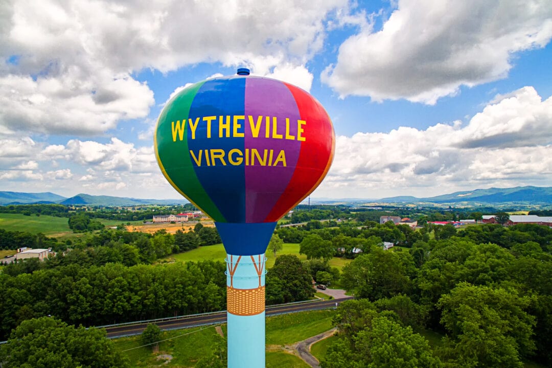 a water tower for wytheville virginia painted to resemble a rainbow-colored hot air balloon