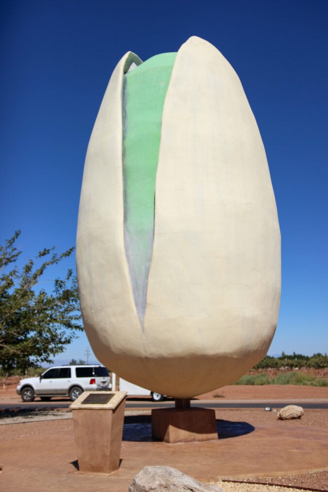 a large white and green concrete pistachio