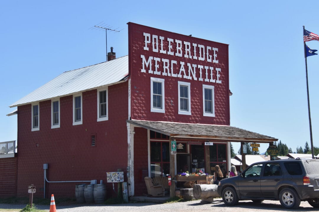 a red 2-story building housing the polebridge mercantile