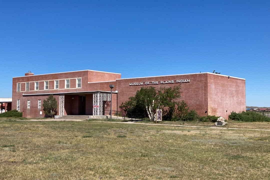 a 2-story brick building housing the museum of the plains indian