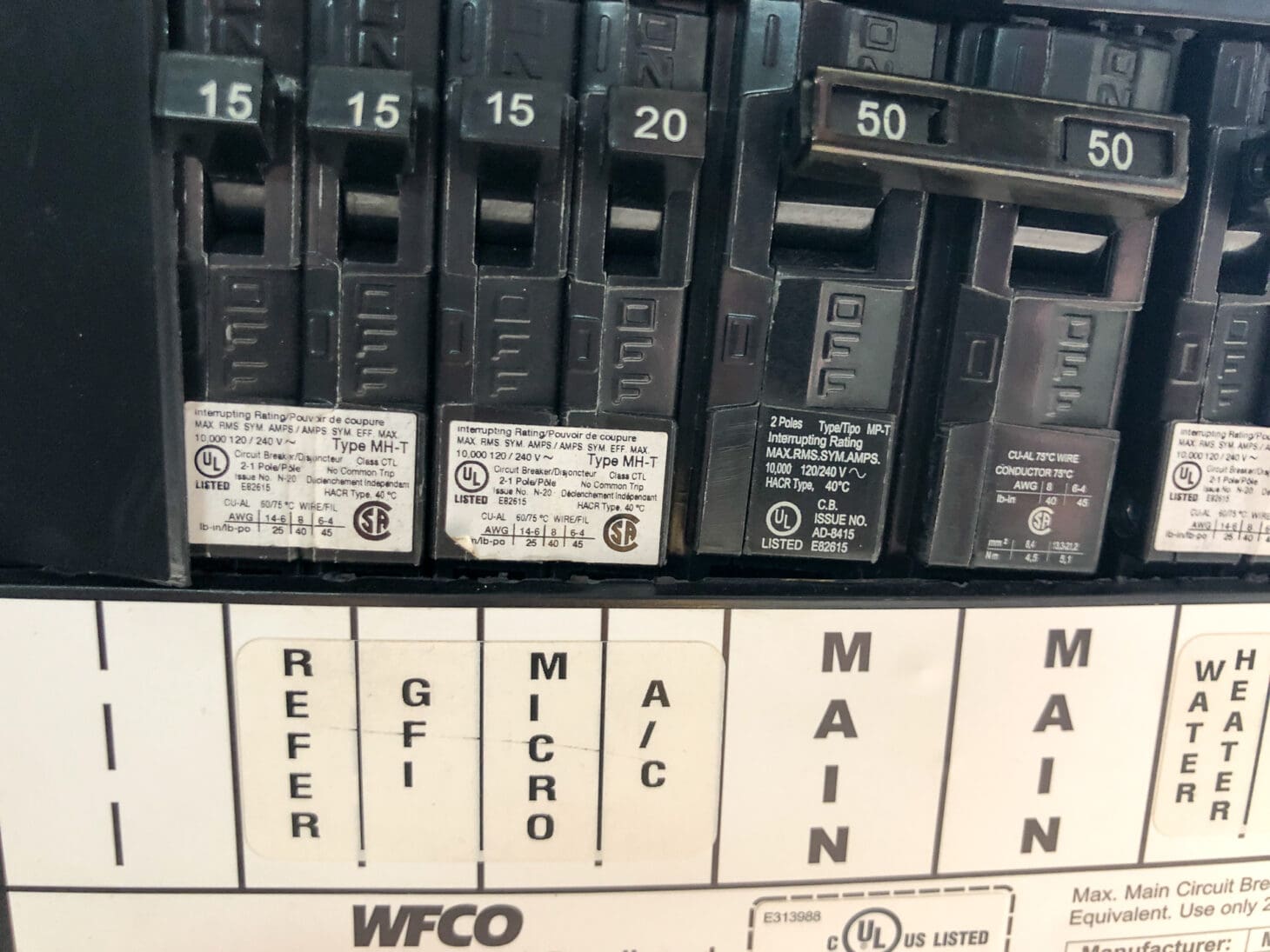 Closeup of an RV fridge circuit panel.