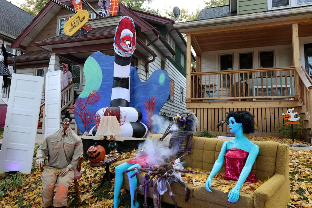 a halloween yard display with characters from beetlejuice