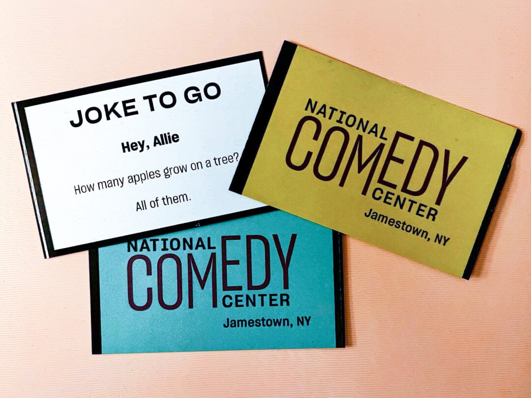 three business card size cards from the national comedy center