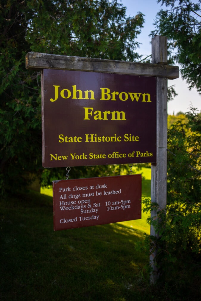 a sign for the john brown farm state historic site