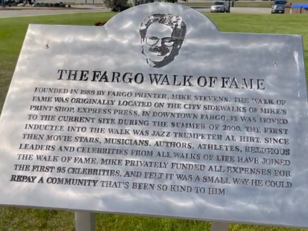 A plaque explains the history of the Fargo, North Dakota Walk of Fame.