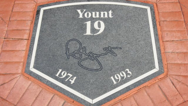 A plaque shaped like homebase on a baseball field is engraved with the name of a player, "Yount."
