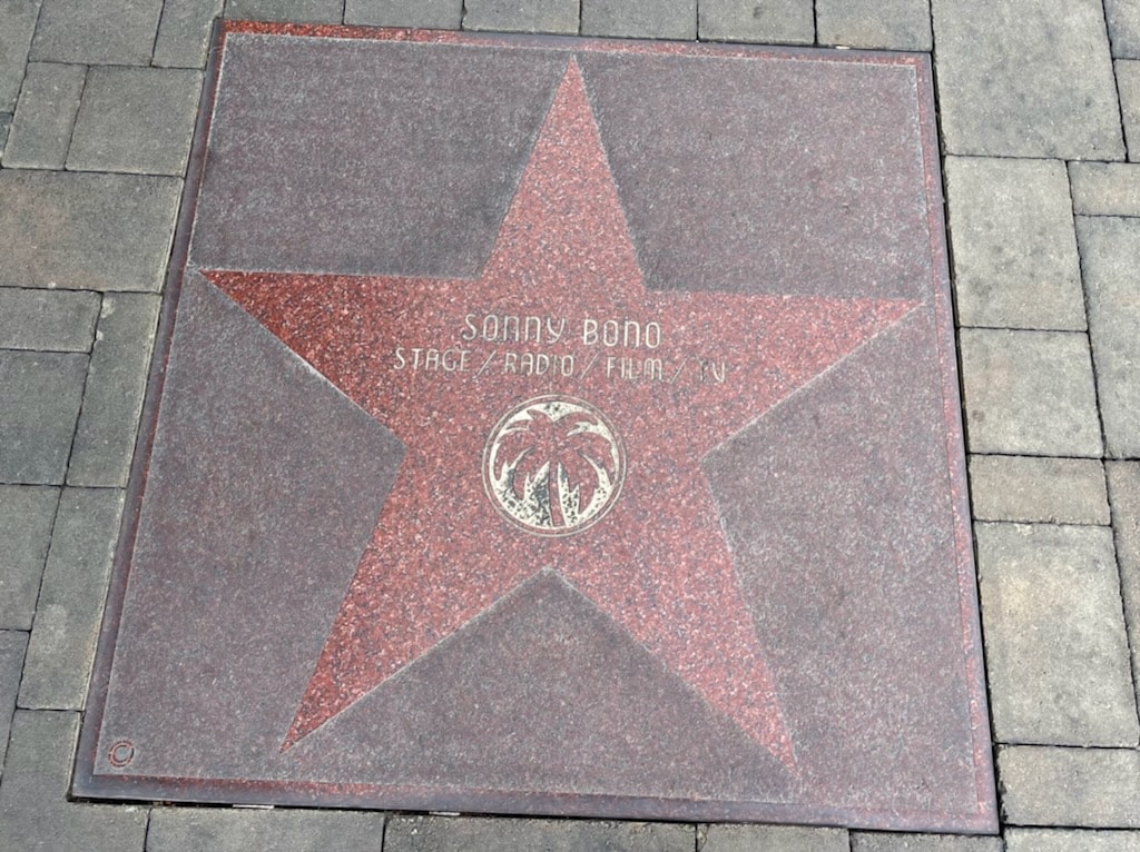 A pink star set in the ground honors performer and longtime Palm Springs resident Sonny Bono.