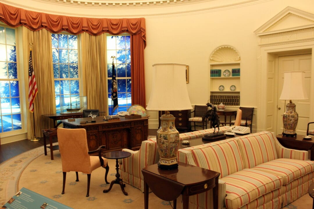 The interior of the Jimmy Carter Library is filled with historical furniture.