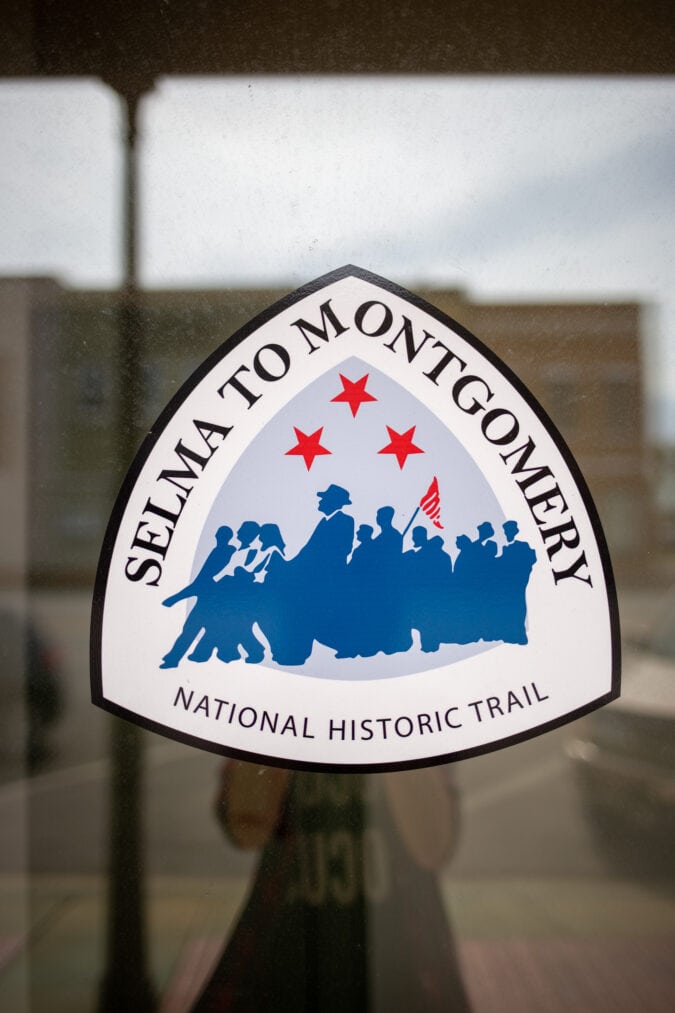 A sticker on a glass window reads "Selma to Montgomery National Historic Trail."