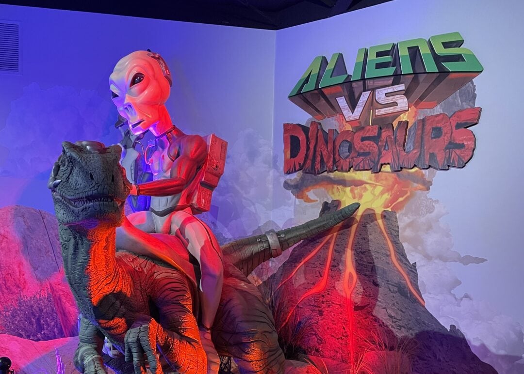 A quirky "aliens vs. dinosaurs" exhibit at The Thing Travel Center in Arizona