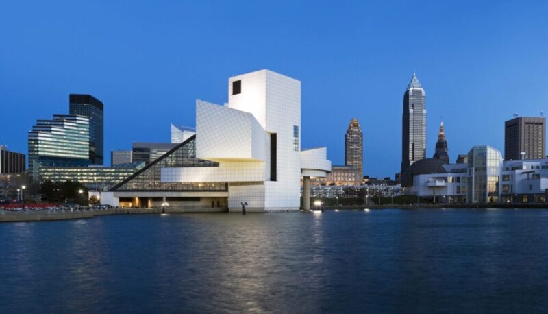 Skyline of Cleveland from a lake view with the Rock and Roll Hall of Fame building as the focal point