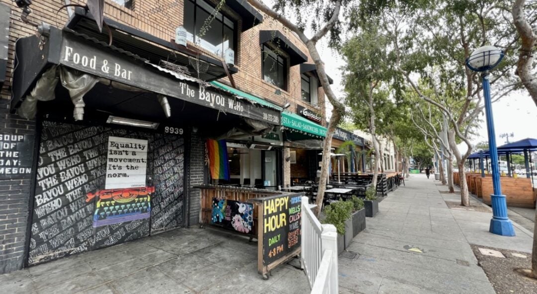 A small restaurant/bar advertises that it's a LGBTQ+ friendly establishment