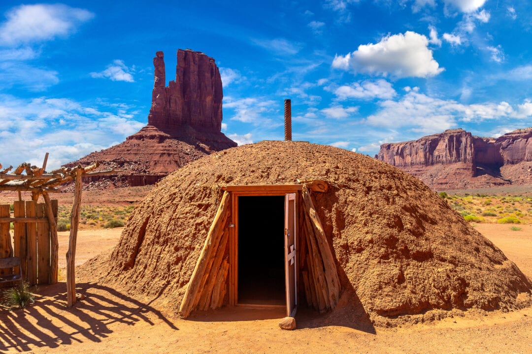 A doorway is open in a mound dwelling at Monument Valley