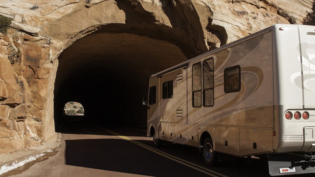 Motor home on the road, traveling through a tunnel in the Zion National Park, Utah