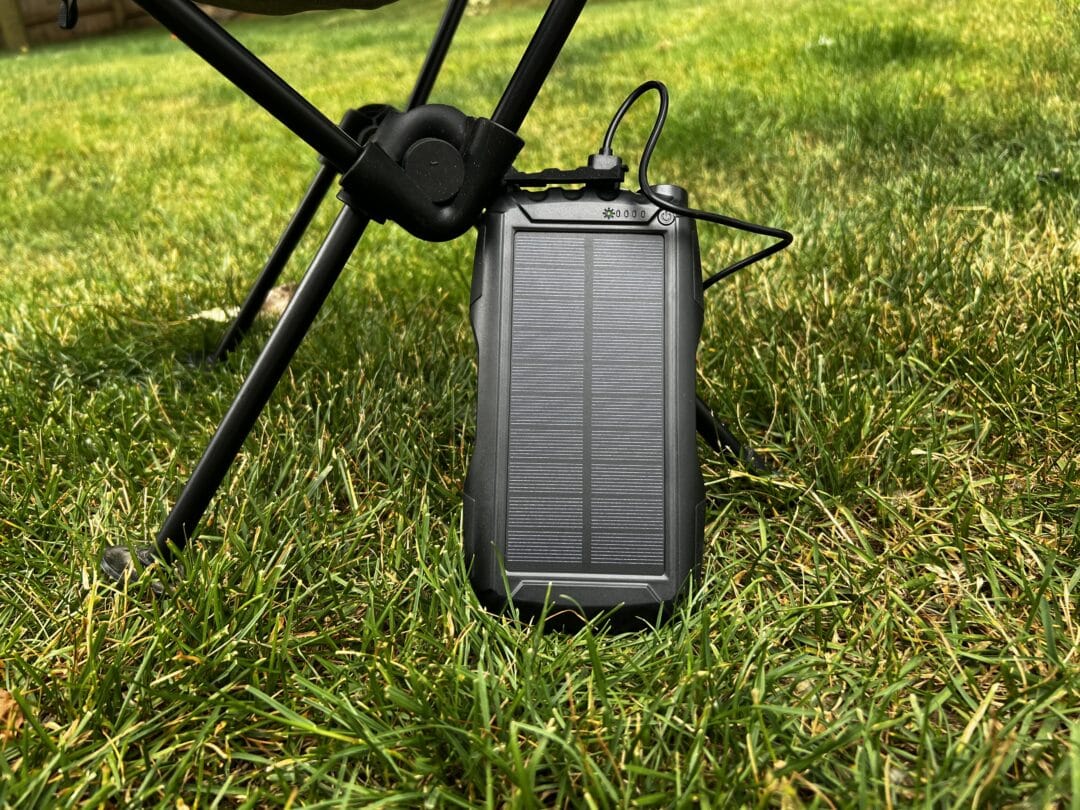 Solar charger sitting in the grass